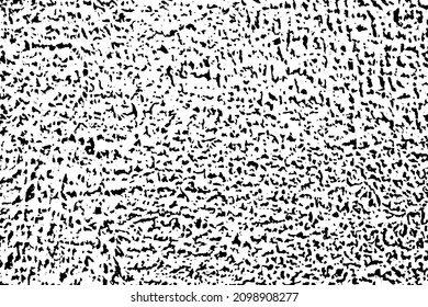 Grunge texture of a rough uneven surface with noise, granularity, granules, random particles. Abstract rough monochrome background. Vector illustration. Overlay template.