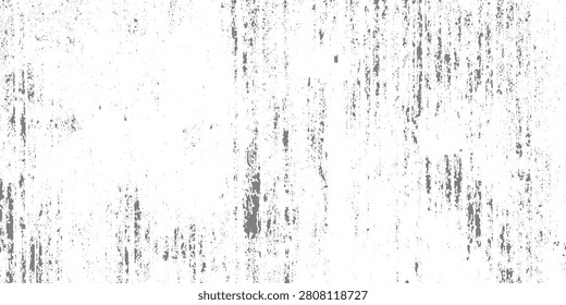 Grunge texture with vertical distressed streaks, resembling worn painted wood or weathered plaster. surface has irregular gray and black scratch lines spread across a faded white background.