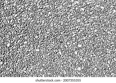 Grunge texture of a wall made of small stones. Monochrome background of fine gravel with spots, noise and grain. Overlay template. Vector illustration