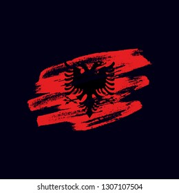 Grunge textured Albanian flag. Vector brush painted flag of Republic of Albania isolated on dark blue background. Frayed and scratched the national symbol of the European country