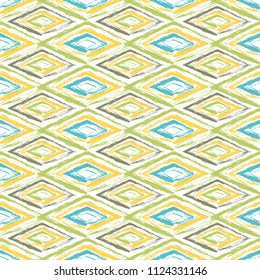 Grunge textured rhombs seamless pattern design. Abstract geometric background