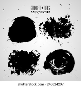 Grunge textures set. Black ink stains. Isolated elements. Abstract paint texture. Hand drawn painted background. Vector illustration.