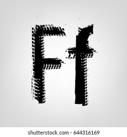 Grunge tire letter F. Unique off road isolated lettering in a black colour. Vector illustration.