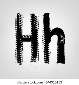 Grunge tire letter H. Unique off road isolated lettering in a black colour. Vector illustration.