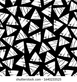 Grunge triangles on black background seamless pattern. Vector illustration.