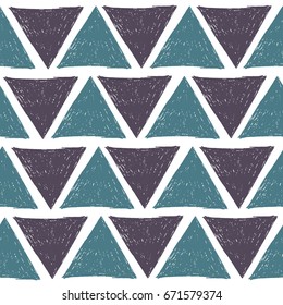 Grunge triangles - seamless pattern in blue and purple. Abstract geometric background.  