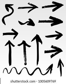 Grunge vector arrows. Dry brush strokes