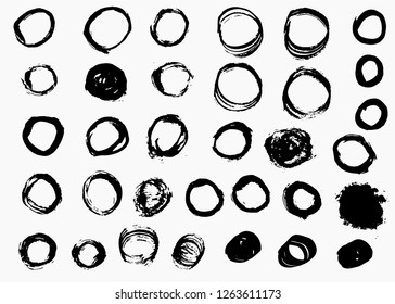 Grunge vector circles. Brush strokes badges, hand drawn, isolated