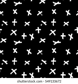 Grunge vector crosses. Seamless pattern on chalkboard.