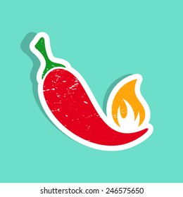 Grunge vector red hot chilli pepper with flame