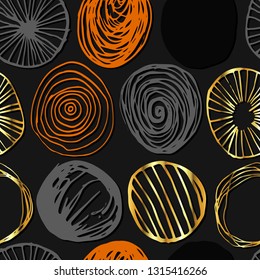 Grunge vector seamless pattern. Abstract hand drawn round shapes in orange, gold and gray colors on dark background. Repeating wallpaper. Trendy texture design.