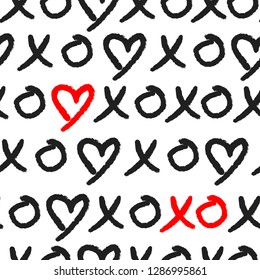 Grunge vector seamless pattern with hand painted hearts and words xoxo. Ditsy print for valentines day wrapping paper decor or wedding invitation card background in black and white colors