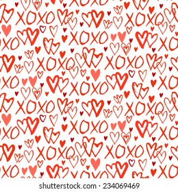 Grunge vector seamless pattern with hand painted hearts and words xoxo. Bright red small print for valentines day wrapping paper decor or wedding invitation card background