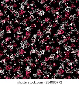 Grunge vector seamless pattern with hand painted hearts and words xoxo. Bright ditsy print for valentines day wrapping paper decor or wedding invitation card background in white, black and pink colors