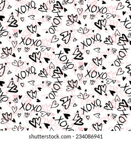 Grunge vector seamless pattern with hand painted hearts and words xoxo. Ditsy print for valentines day wrapping paper decor or wedding invitation card background in white, black and pink colors