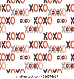 Grunge vector seamless pattern with hand painted  words xoxo. Bright fun ditsy print for valentines day wrapping paper decor or wedding invitation card background