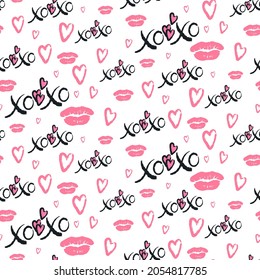 Grunge vector seamless pattern with XOXO hand written phrase, hearts isolated on white. Hugs and kisses sign. Modern ink calligraphy. Illustration design for Valentines Day, wedding invitation card