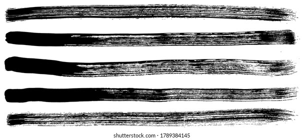 Conjunto de pincel de trazos vectoriales Grunge. El pincel negro pincha sobre un fondo blanco.