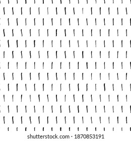 Grunge vertical small brushstrokes seamless vector pattern. Brush strokes dashes and shapes. Hand drawn abstract ink background. Lines of dashes, small splotches and blobs. Abstract wallpaper design