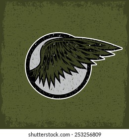 grunge vintage sport label with wings