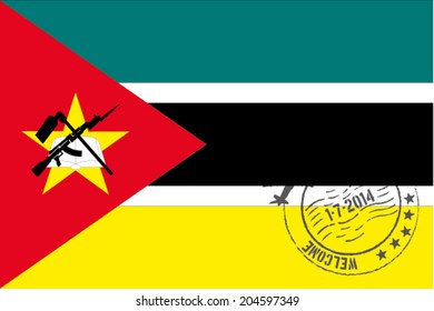 Grunge welcome rubber stamp with date on the flag of Mozambique