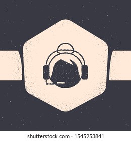 Grunge Woman with a headset icon isolated on grey background. Support operator in touch. Concept for call center, client support service. Monochrome vintage drawing. Vector Illustration