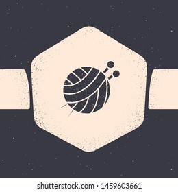Grunge Yarn ball with knitting needles icon isolated on grey background. Label for hand made, knitting or tailor shop. Monochrome vintage drawing. Vector Illustration