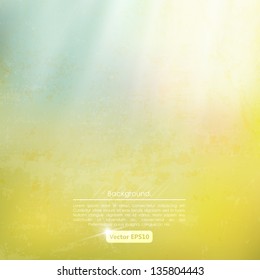 Grunge yellow-blue background with sunrays. Wall.