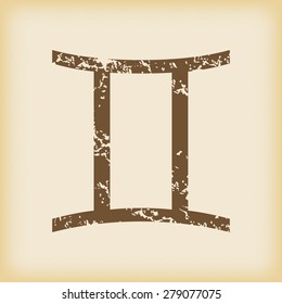 Grungy brown icon with gemini zodiac symbol, on beige background