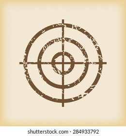 Grungy brown icon with image of aim, on beige background