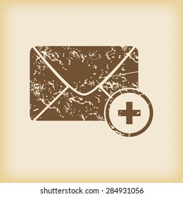 Grungy brown icon with image of envelope with plus, on beige background