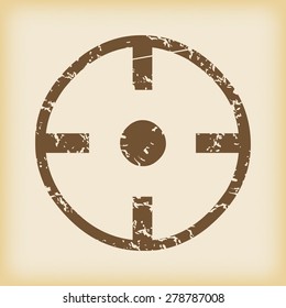 Grungy brown icon with image of target, on beige background