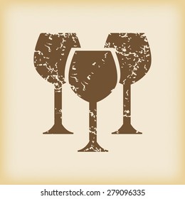 Grungy brown icon with image of three wine glasses, on beige background