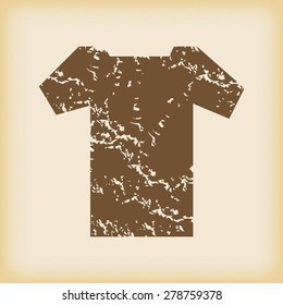 Grungy brown icon with image of t-shirt, on beige background