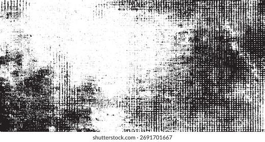 Grungy halftone texture background with distressed abstract black ink dots and splatter pattern on white surface.