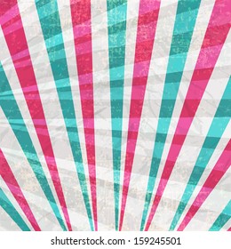 Grungy retro background with colorful rays..