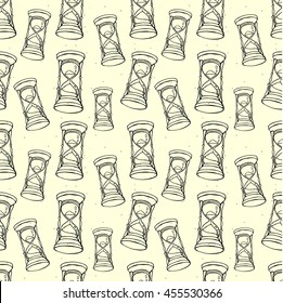 Grungy seamless pattern with hourglass in sketch handdrawn style. Inky vector  illustration.