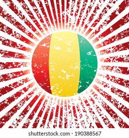 Grungy vector background with flag of Guinea.