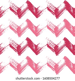 Grungy watercolor brush stripes seamless pattern. Red and pink paintbrush lines horizontal seamless texture for backdrop. Hand drown paint strokes decoration. For fabric.