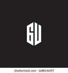Monograma del logotipo de la GU con una plantilla de diseño de estilo hexagonal aislada en fondo negro
