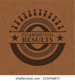 Guaranteed results badge with wooden background