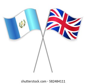 Guatemalan and British crossed flags. Guatemala combined with United Kingdom isolated on white. Language learning, international business or travel concept.