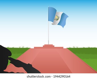 The Guatemalan flag flies above the pole in the image of a soldier saluting the flag