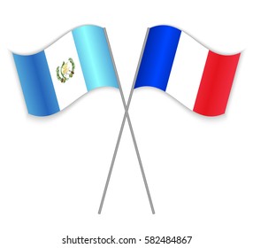 Guatemalan and French crossed flags. Guatemala combined with France isolated on white. Language learning, international business or travel concept.
