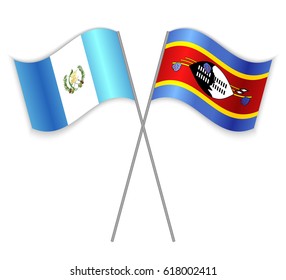 Guatemalan and Swazi crossed flags. Guatemala combined with Swaziland isolated on white. Language learning, international business or travel concept.
