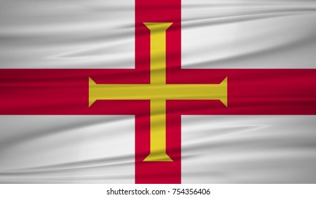 guernsey flag vector. Vector flag of guernsey blowig in the wind. EPS 10.