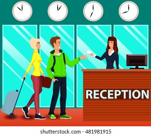 Guests are receiving the access card for the room at the hotel's reception.