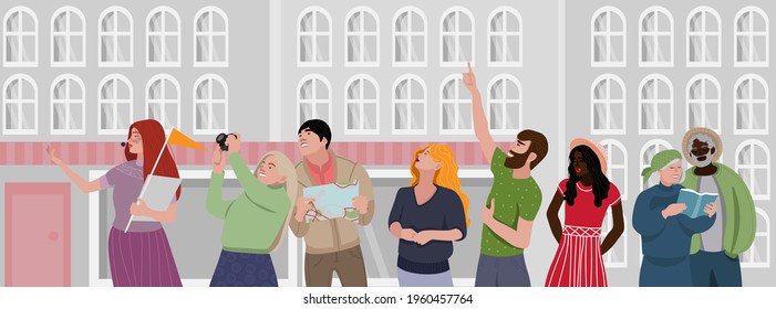 A guided tour group is exploring the street. The group consists of an elderly and young couple, girls and a guy of different races, who listen to the guide.