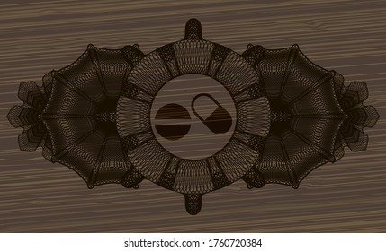 Guilloche decoration pills medicines icon inside dark wooden realistic emblem. Brown exquisite background. Artistic illustration. 