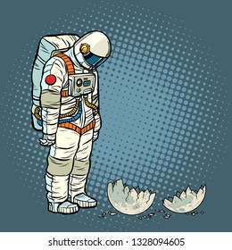 guilty astronaut looks at the ruined moon. Pop art retro vector illustration vintage kitsch